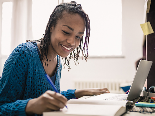 Online Adult Masters Student Studying Laptop