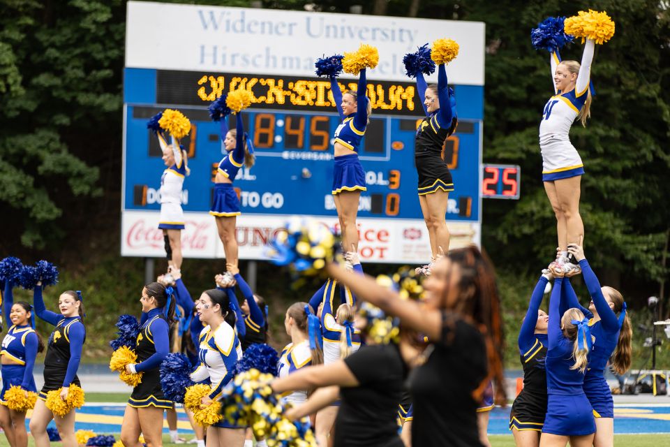Cheerleaders and dance team perform in the pre-game show.