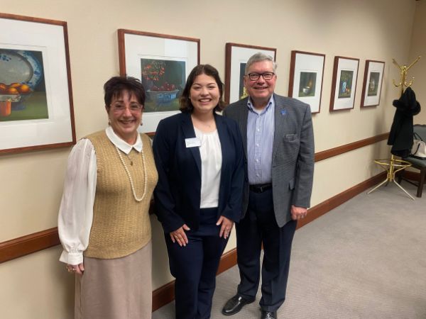 Marietta and Mike Borinski stand beside Lizzy for a photo.