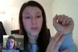 Graduate nursing students practice delivering telehealth care.