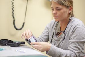 Female BSN degree nursing student in clinical setting