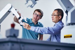 SOE Robotics Program Student With Faculty