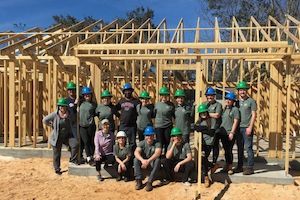 students build a home during alternative spring break