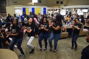 students perform at late night breakfast