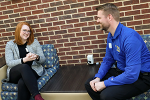 Widener graduate admissions coach talking with student
