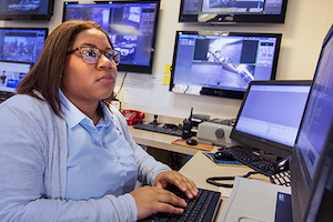 A woman in a criminal justice career completes her work for the day.