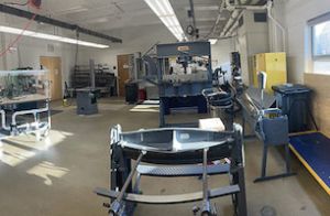 A multi-purpose machining facility containing a variety of engineering machines