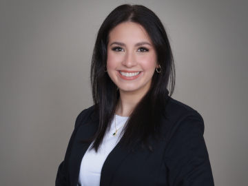 A headshot portrait of Olivia Mistichelli