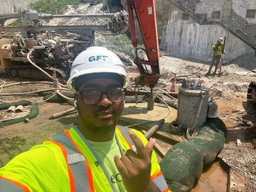 Semaj Smith-Barber takes a selfie while on-site during his internship with GFT.