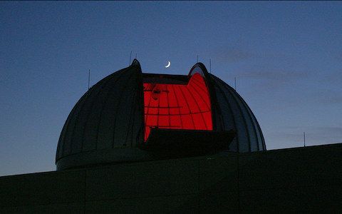 widener university observatory glows red at night while stargazing