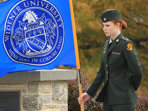 military student with flag