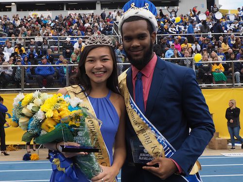 homecoming king and queen with crown and flowers